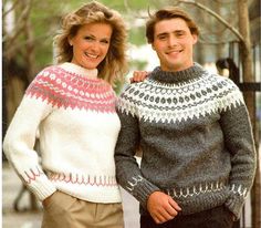 a man and woman standing next to each other on the street wearing sweaters with fair - knit patterns