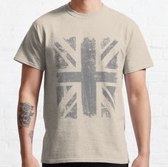 Standard fit with double-needle hems for durability. Solid colors are 100% preshrunk cotton, heather colors are cotton blend. Range of colors available, with the option to print on front or back. Size range S-3XL, suitable for men and women. Distressed Look Grey Union Jack British Flag Crew Neck Cotton T-shirt With Punk Style, Grunge Cotton T-shirt With Sublimation Print, Alternative Cotton T-shirt With Sublimation Print, Grunge Pre-shrunk Cotton T-shirt, Gray Grunge Crew Neck T-shirt, Gray Cotton Punk Style Top, British Flag, Union Jack, Solid Colors