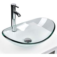 a glass sink with chrome faucet on top