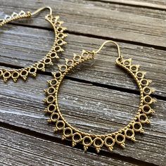 Step into the world of timeless elegance with our Handcrafted Mandala Hoop Brass Earrings - a mesmerizing blend of artistic flair and bohemian charm. Meticulously crafted in brass, these earrings feature intricate mandala designs that add a touch of spirituality and style to your ensemble. Material: High Quality Brass  Width - 2 1/4 inches (5.71cm) Length - 2.5 inches (6.35cm) LIGHTWEIGHT  🌟 **Key Features - **Artisanal Craftsmanship Each pair is meticulously handcrafted, ensuring a unique and individual touch. - **Bohemian Mandala Design Delicate hoops adorned with intricately designed mandalas, creating a harmonious balance of artistry and style. - **Versatile Statement These earrings effortlessly complement both casual and formal outfits, making them a versatile addition to your jewelr Intricate Brass Hoop Earrings, Bohemian Dangle Brass Jewelry, Bohemian Brass Dangle Jewelry, Bohemian Metal Dangle Hoop Earrings, Metal Hoop Jewelry With Intricate Design, Bohemian Teardrop Jewelry With Ear Wire, Intricate Hoop Metal Jewelry, Bohemian Metal Hanging Hoop Earrings, Bohemian Oxidized Chandelier Earrings For Festive Occasions