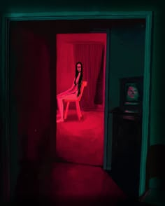 a painting of a woman sitting on a chair in a room with red light coming from the window