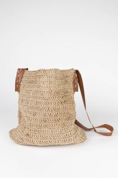 Bring organic style to every outfit with the Crochet Jute Shoulder Bag. A beautiful leather strap hangs at just the right length. Throw in your phone, keys, and wallet, and head out. Ethically handcrafted in small batches by environmentalist artisans with Prokritee, an organization in Bangladesh that provides jobs and skills training for women in under-resourced communities. Prokritee improves women's standard of living with safe jobs, fair wages, and the goal of self-reliance, helping mothers s Skill Training, Organic Style, Leather Shoulder Bag, Leather Bag, Leather Straps, Wallet, Shoulder Bag, Crochet, Leather