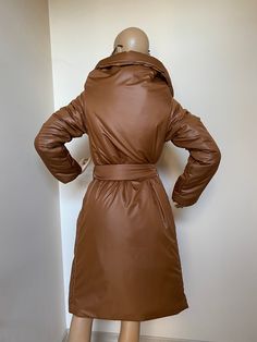 "This is an atmosphere comfortable and warm winter jacket. Big collar/rich neckline. With two pockets and belt. Fully lined. Fastering with discret buttons on arms Available in 4 different lengths 60 cm / 24 inches 80 cm / 31 inches 105 cm / 41 inches 125 cm / 49 inches The jacket on the photo is 105 cm, 41 inches long. SIZE CHART SIZE S - US 6, UK 8, EU 36 bust: bust around 34.5\"/90cm Waist: waist around 27.5\"/70cm Hips: hips around 34.5\"/90cm SIZE M - US 8, UK 10, EU 38 bust: bust around 37 Belted Winter Outerwear, Belted Brown Outerwear For Winter, Brown Belted Winter Outerwear, Fitted Brown Puffer Outerwear, Brown Hooded Puffer Outerwear, Luxury Brown Puffer Jacket, Luxury Brown Puffer Jacket With Pockets, Brown Plush-lined Outerwear For Cold Weather, Luxury Brown Full-length Outerwear