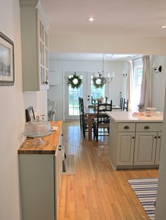 the kitchen is clean and ready to be used as a dining room or living room