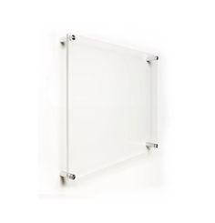 a white wall mounted glass shelf with two metal brackets on the bottom and one side