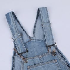 Introducing our latest addition to the Women's Jumpsuits collection: the New Blue Denim Jumpsuit Rompers! Crafted with high-quality denim material, these jumpsuits boast a classic yet trendy look that will never go out of style. The strappy design adds a touch of femininity, making it a versatile piece that can be dressed up or down. Whether you're going for a casual daytime look or a chic evening outfit, this jumpsuit is perfect for any occasion. Get ready to turn heads and make a statement wit Casual Blue Overalls With Suspenders, Light Blue Denim Overall Jumpsuit With Pockets, Light Blue Overall Jumpsuits With Pockets, Blue High-waisted Denim Jumpsuit With Pockets, Light Blue Overall Jumpsuits And Rompers With Pockets, Trendy Denim Overall Jumpsuit With Suspenders, Blue Denim Jumpsuit With Pockets And High Waist, Blue High Waist Denim Jumpsuit With Pockets, Blue Denim Overall Jumpsuit With Pockets