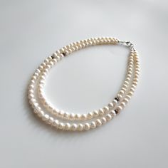 "< White and blue pearl necklace > It is well known fact, that pearls are the best accessory for weddings. But it is not only bridal jewelry. As Jackie Keneddy once said \"Pearls are always appropriate\". We can not disagree with this. Pearl jewelry is same perfect for special occasions and daily life. There is nothing more elegent and feminine like pearls. Every woman should have such a perfect beauty in her jewelry box. > Necklace's length- 39 cm (15,3 in) > Necklace's weight - 50 Wedding Akoya Pearl Beaded Necklaces With Round Beads, White Double Strand Pearl Drop Necklaces, Wedding Pearl Necklaces With Natural Stones, Wedding Necklaces With Natural Stones And Pearls, White Double Strand Pearl Necklaces, Pearl White Necklaces With Natural Stones, White Akoya Pearl Beaded Necklaces, White Double Strand Gemstone Beaded Necklace, Double Strand Pearl Necklaces With Gemstone Beads