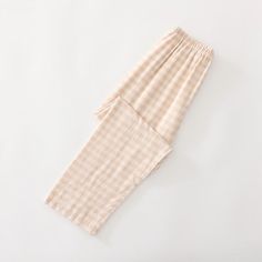 Discover ultimate comfort and style with Ever Lasting's Gingham Soft Cotton Pajama Pants. Crafted from soft, breathable cotton, these pajama pants combine classic sophistication with cozy loungewear. The timeless gingham pattern adds a touch of elegance, making these pants perfect for relaxed mornings and warm nights. Whether you're unwinding after a long day or enjoying a leisurely weekend, these pajama pants ensure you stay comfortable and stylish. Embrace the perfect blend of chic design and cozy vibes with our Gingham Soft Cotton Pajama Pants, ideal for those who appreciate elegant and timeless sleepwear. Treat yourself to the best in comfort and style today. Features: 100% Cotton Unisex Style Relax Fit (stretchy waistband) Breathable (great for all seasons) Machine Safe Shorts Sizes:S Cotton Sleepwear Trousers With Elastic Waistband, Summer Plaid Loungewear Pants, Summer Plaid Pants For Loungewear, Plaid Bottoms With Elastic Waistband For Loungewear, Casual Gingham Sleepwear For Pajama Party, Casual Gingham Sleepwear For Loungewear, Comfortable Full-length Cotton Sleepwear, Comfortable Full Length Cotton Sleepwear, Cotton Gingham Bottoms For Loungewear