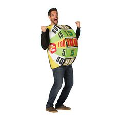 a man in a wheel of fortune costume is smiling and holding his hands up to the side