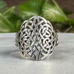 Handcrafted Solid Sterling Silver .925/ Celtic Knot Ring 100% hand-polished solid sterling silver Approximate weight 4.3 grams Splendid Celtic knot ring crafted in solid 925 sterling silver. The ring came with a 925 stamp in the inside of the ring. A Celtic Knot is a symbolic pattern of a looped knot that has no start or finish. The looped pattern goes on infinitely, which is thought to symbolize the eternity of life. The design is classic and smooth looks really good on both women and men.  All Antique Silver Sterling Silver Promise Ring Jewelry, Silver Rings With Intricate Symbolic Design, Silver Rings With Oxidized Finish For Gift, Silver Symbolic Ring With Intricate Design, Symbolic Silver Ring With Intricate Design, Silver Oxidized Finish Rings For Gift, Bohemian Silver Rings With Polished Finish, Classic Silver Infinity Jewelry, Silver Sterling Silver Infinity Rings