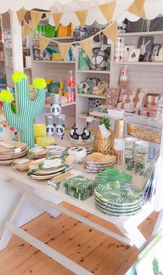 the table is covered with plates and bowls