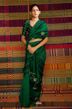 Emerald green haritah embroidered saree with mandala motifs. Comes with blouse.
Component: 2
Pattern: Embroidery
Type Of Work: Mandala
Sleeve Type: Half
Fabric: Maheshwari Silk
Color: Emerald Green
Other Details: 
Zari embroidery
Tassel detailing
Occasion: Wedding - Aza Fashions Green Blouse Designs, Green Sari, Green Mandala, Mehendi Outfits, Simple Saree Designs, Daisy Wallpaper, Simple Sarees, Silk Saree Blouse Designs, Embroidered Saree