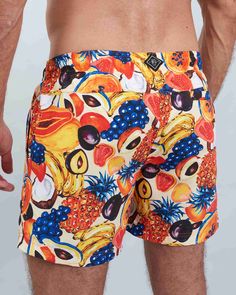 Sport a stylish look with these swim shorts, featuring a unique tutti frutti design. Benefits: Fashionable and environmentally responsible, made from recycled materials. Quick-drying fabric for superior comfort and convenience. Perfect for beach days or lounging by the pool. Practical design includes a hidden pocket and a "wet bag" for essentials. We donate 10% of all swim shorts sales to SANCCOB, supporting the rescue and rehabilitation of African penguins and seabirds. Multicolor Cotton Swim Trunks, Orange Short Swim Trunks With Built-in Shorts, Multicolor Sports Swim Trunks With Built-in Shorts, Multicolor Swim Trunks With Built-in Shorts For Poolside, Swim Shorts Women, Multicolor Swim Trunks With Built-in Shorts, Summer Swimwear, Mens Swim Shorts, Pyjama Bottoms