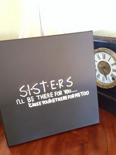 a sign that says sisters i'll be there for you and an old clock