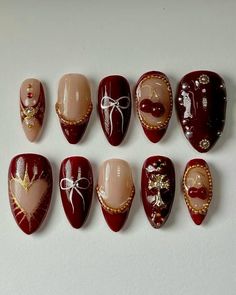 Red And Gold Minimalist Nails, Dark Academia Nail Designs, Dark Red Nail Ideas With Design, Red Beige Nails, Wine Red Nails Aesthetic, Dark Red Gold Nails, Garnet And Gold Nails, Dark Red Nails With Gold, Dark Red And Gold Nails