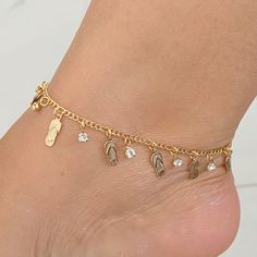 Our stunning Gold Filled Summer Anklet is a perfect accessory to adorn your ankles with elegance and seaside charm. This exquisite anklet is designed to capture the essence of summer and infuse your look with a radiant golden glow. The Gold-Filled Summer Anklet is the perfect accessory to showcase your love for the beach and embrace the carefree spirit of summer. It also makes for a delightful gift choice for those who enjoy the sun, sand, and ocean breeze. ITEM DESCRIPTION Beach Anklet Material Elegant Gold Anklets For Vacation, Toe Ring Anklets For Beach Season Gift, Silver Anklets For The Beach, Silver Anklets With Ankle Strap For Beach, Silver Ankle Strap Anklets For Beach, Beach Season Ankle Wrap Jewelry, Adjustable Silver Anklets For Vacation, Silver Adjustable Anklets For Vacation, Adjustable Silver Anklets For Beach Season