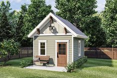 a small shed with a bench in the yard