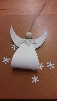 an ornament made out of paper with snowflakes