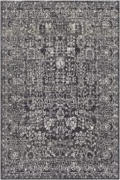 a black and white rug with an intricate design