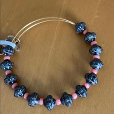 Nwt Brown Saturn Beads Melon Accents Beads Oval Beads Beaded Bracelet For Gift, Stretch Bracelet With Large Round Beads, Metal Beaded Bracelets, Initial Charm Bracelet, Alex And Ani Bangles, Blue Charm, Alex And Ani Bracelets, Bangles Making, Bead Bangles