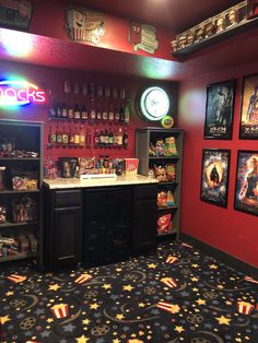 a room with various movie memorabilia on the walls