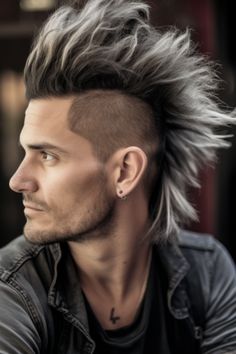 Long hair with a faux hawk style adds a twist to traditional long hairstyles for men. It’s especially suitable for those with textured hair and achieves its height with the help of a strong-hold gel. Click here to check out more irresistible long hairstyles for men. Long Hair Faux Hawk, Hair Faux Hawk, Men's Long Hair, Hair Lookbook, Long Hairstyles For Men, Hairstyle Tips, Sea Salt Spray, Long Hairstyle, Faux Hawk