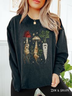 Spooky Cottagecore Shirt, Witchy Ghost Herbology T-Shirt, Mushroom Vegetable Gardening Sweatshirt, Botanical Nature Tee Gift For Plant Lover Color: Black Embrace your love for all things floral, cottagecore, and summer-inspired with our Comfort Colors lightweight crewneck sweatshirt. Made from 100% ring-spun cotton, this sweatshirt is as soft as a summer breeze and perfect for those cozy evenings spent surrounded by your favorite blooms. Product Details: - 100% ring-spun cotton - Light fabric (6 Spooky Cottagecore, Mushroom Vegetable, Gift For Plant Lover, Floral Cottage, Cottagecore Shirt, Nature Tees, Floral Cottagecore, Vegetable Gardening, Summer Breeze