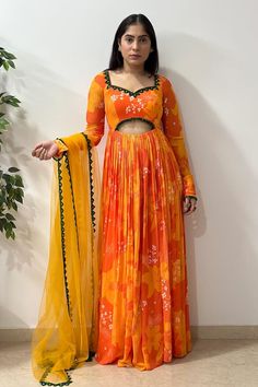 Yellow, orange padded anarkali with bloom print and sequin, mirror, crystal drops embroidered neckline and waist in front. Paired with border embroidered dupatta. - Aza Fashions Orange Georgette Sharara With Zari Work, Traditional Orange Dress With Pallu, Orange Georgette Traditional Wear With Pallu, Fitted Maxi Length Anarkali Set With Gota Work, Festive Orange Georgette Traditional Wear, Bollywood Style Orange Choli With Zari Work, Anarkali Style Orange Lehenga For Navratri, Festive Anarkali Orange Lehenga, Orange Choli With Dori Work For Navratri