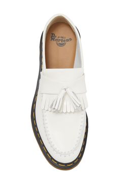 White Leather Casual Tassel Loafers, White Leather Tassel Loafers For Spring, Casual White Leather Tassel Loafers, White Low-top Loafers With Stitched Sole, White Tassel Loafers With Round Toe For Spring, Classic White Loafers With Cushioned Footbed, White Tassel Loafers For Spring Workwear, White Round Toe Casual Tassel Loafers, White Brogue Loafers For Spring