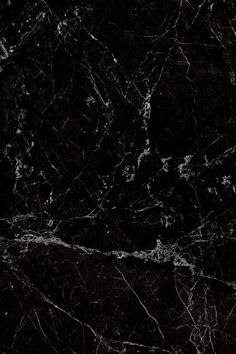 black marble textured with white vein lines