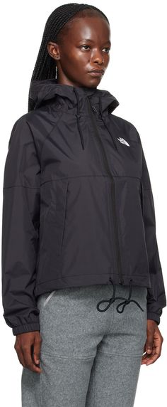 DWR-coated DryVent™ 2L nylon ripstop jacket. Breathable, windproof, and water-repellent. · Drawstring at hood and hem · Stand collar · Zip closure · Logo bonded at chest and back · Zip pockets · Raglan sleeves · Text printed at cuff · Elasticized cuffs · Patch pocket at interior · Partial mesh lining Supplier color: TNF black Functional Track Jacket With Drawstring Hood For Outdoor Activities, Sporty Nylon Windbreaker For Rainy Weather, Nylon Windbreaker With Drawstring Hood For Hiking, Outdoor Track Jacket With Drawstring Hood, Waterproof Nylon Track Jacket For Hiking, Waterproof Nylon Track Jacket For Outdoor Activities, Nylon Track Jacket With Adjustable Hood For Outdoor Activities, Nylon Track Jacket With Adjustable Hood For Hiking, Waterproof Nylon Hooded Track Jacket