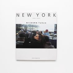 the new york magazine is on display in front of a white wall with an image of people