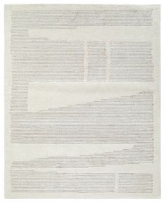 a large white rug with lines on the bottom and one line drawn across it in different directions