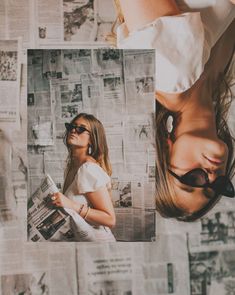 a woman laying on top of a bed next to a wall covered in newspaper paper