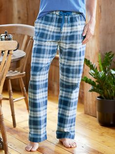 Kick back and relax or turn in for the night — either way, you'll enjoy the comfort of our signature flannel. Our flannel is woven for us in Portugal where it's triple brushed, on both sides, for added softness, loftiness, and warmth. And our sleep pants are designed with a relaxed fit and offer complete coverage in addition to a full elastic waist with adjustable drawstring, hidden button fly, and quarter-top pockets. Extra-soft triple-brushed flannel Hidden button fly Elastic waist with adjust Cozy Plaid Bottoms For Loungewear, Fall Cotton Sleep Bottoms, Cotton Sleep Pants For Fall, Plaid Long Pants For Lounging, Cotton Sleep Pants, Mens Flannel Pajamas, Vermont Country Store, Flannel Pajama Pants, Mens Flannel