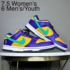 Golden Yellow/Purple/Teal Green Blue/White Low Top Nike Dunk Sneakers. Brand New In Original Box. Comes With Extra Purple And Teal Laces. Size 6 Youth, Equal To Size 7.5 In Women’s. Custom Purple Sneakers For Sports, Nike Air Max Grey, Dunk Low Shoes, Low Top Nikes, Air Max 270 Women, Sneaker Ball, Nike M2k, Purple And Teal, Purple Nikes