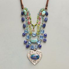 WORLD LOVE NECKLACE -- A rose gold bezel provides a strong and beautiful focal point on Jes MaHarry's tiered necklace of lapis, apatite, gaspiete, kyanite, peridot, turquoise, azurite, pink tourmaline, and a diamond-kisssed, 14kt yellow gold star. Sterling silver slider bead. USA. Exclusive. Adjustable to 39"L. Wire Necklaces, Sundance Jewelry, Cowgirl Bling, Tiered Necklace, Necklace Ideas, Sundance Catalog, Diamond Solitaire Necklace, Dainty Pendant, Solitaire Necklaces