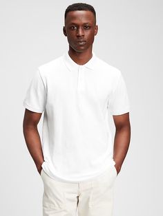 Pique Polo Shirt | Gap Classic White Short Sleeve Polo Sweater, White Short Sleeve Polo Sweater For Work, White Polo Shirt With Seamless Collar For Work, White Seamless Collar Polo Shirt For Work, White Short Sleeve Polo Sweater With Ribbed Collar, Sporty Short Sleeve Polo Shirt For Work, Gap Collared Top With Placket, Classic Solid Color Gap Tops, Classic Gap Tops