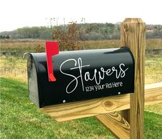 a black mailbox with the words savors on it