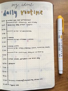 an open notebook with a daily routine on it and a yellow pen next to it