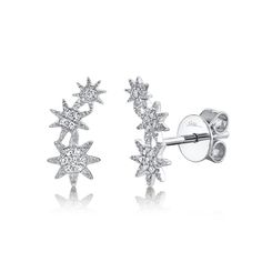 SKU: SC55006157 0.06CT 14K W/G DIAMOND STAR STUD EARRING Metal Type: 14K White GoldMetal Weight: 1.20 Gr.Side Stone Shape: RoundSide Stone Weight: 0.06 Ct.Dimensions: 0.20" Width / 0.00" Height / 0.45" LengthOther Information: 0.45"L / 0.20"WKate Collection Gold Star Earrings, Ear Crawler Earrings, Crawlers Earrings, Star Stud Earrings, White Gold Earrings Studs, White Gold Studs, Studded Necklace, Star Earrings Stud, Diamond Star