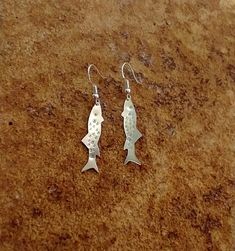 "Trout earrings, sterling silver.  I've volunteered with various fish conservation groups over the years and I love my local trout!  I love helping laws get passed to keep the rivers clean.  And yes, I love to catch and eat them too. The fish themselves are 1.25\" long in this photograph.  However, you have the option to choose the smaller 1\" fish." Trout Earrings, Silver Wire Rings, Fish Earrings, Fish Jewelry, Fish Necklace, Silver Fish, Gold Moon, Onyx Bead