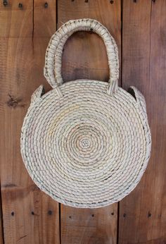 Lightweight Bag. Large Bag. Hand died palm leaf. Round Handel. Beach Bag. TASSEL SOLD SEPARATELY Diameter- 10 inches Height including handals- 15 inches Bohemian Handwoven Bags For Spring, Handwoven Bohemian Bags For Spring, Bohemian Natural Beach Bag For Everyday Use, Bohemian Natural Beach Bag For Spring, Bohemian Natural Straw Bag Fair Trade, Bohemian Natural Beach Bag, Hippie Shoulder Bag For Summer Festival, Bohemian Beach Bag For Summer, Bohemian Beach Bag For Spring