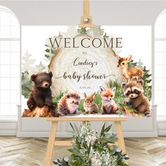 a welcome sign with baby animals on it