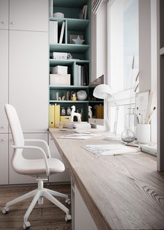 a white office chair sitting next to a wooden desk