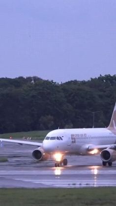 an airplane that is on the runway at night