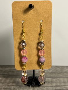 Handmade Earrings - Colors Series Each piece is meticulously handcrafted using craft wire, hypoallergenic earring hooks, and premium beads including crystal, glass, wood, ceramic, acrylic, resin, stone, and silicone beads. Care Instructions: Avoid moisture. Remove prior to bathing, showering, swimming, or exercising. Avoid allowing the item to fold when storing.  Shipping Information: Your items will be shipped within 1-2 business days once payment is received. Shipping within the US is via first class mail or you may choose to upgrade to Priority Mail for a small fee. Each item is carefully wrapped and packaged for safety during transit. Returns & Exchanges: As this is a wearable item, I do not accept returns or exchanges on this item. All sales are final. If there is a problem once your Glass Beaded Earrings For Gift, Glass Beaded Dangle Earrings For Gift, Glass Beaded Earrings With Dangling Beads For Gift, Dangle Crystal Earrings With Czech Glass For Gift, Beaded Glass Drop Earrings, Czech Glass Beaded Dangle Earrings For Gift, Czech Glass Beaded Drop Earrings For Gift, Adjustable Dangle Crystal Earrings With Ear Wire, Czech Glass Beaded Drop Earrings As Gift