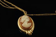 "This is a very beautiful, vintage and unique MILOR ITALIAN CAMEO 14K GOLD pendant necklace brooch (weight 2.8g). The necklace has pendant with Lady cameo, 14K gold (bottom has (MILOR) and 14K yellow gold chain (bottom has 14K). It measures 1\" x 1/2\" pendant and 17 1/4\" long chain. The necklace has a very unique and elegant feel to it and is in very good condition. 0.7  MR" Elegant Cameo Necklace For Formal Occasions, Elegant Cameo Jewelry For Formal Occasions, Formal Yellow Gold Cameo Jewelry, Heirloom Style Formal Necklace With Brooch, Classic Gold Cameo Jewelry, Vintage Yellow Gold Intaglio Necklace, Vintage Gold Jewelry For Opera, Elegant Gold Necklace With Brooch, Antique Yellow Gold Cameo Necklace