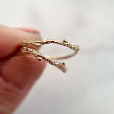 "This nature inspired piece is delicately handcrafted by a skilled artisan. This twig ring is carefully crafted to reflect the organic beauty of nature. 100% recycled gold  Every single ring in my collection is designed, sculpted and produced entirely by hand. I never use computers and I never use \"off-the-shelf\" designs that you see in so many jewelry stores. Each ring begins by casting an actual twig or piece of bark; its natural, imperfectly beautiful texture is imprinted in the gold. This Branch Wedding Ring, Tree Branch Wedding, Nature Inspired Wedding Bands, Twig Wedding Band, Contour Ring, Dainty Wedding Band, Nature Engagement Ring, Dainty Wedding, Twig Tree