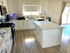 the kitchen is clean and ready for us to use in its new owner's home